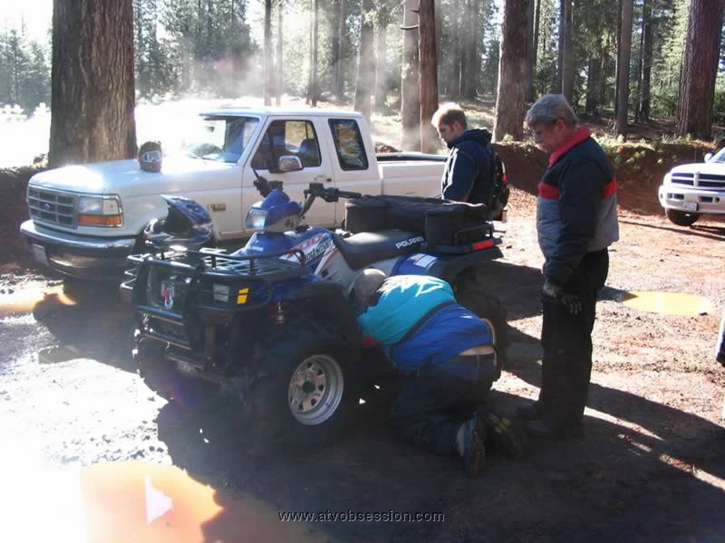 03. Jack fixes his quad, while Logan and Dan watch..jpg