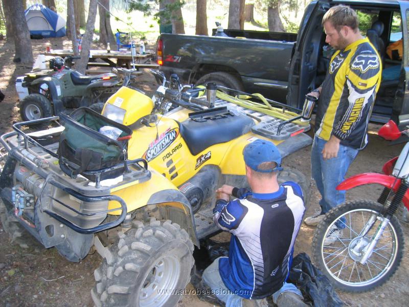 07. Jack installs the left side skid plate..jpg
