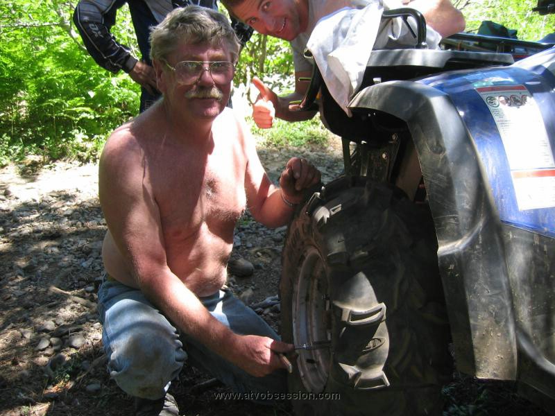 11. Dan puts his repaired tire back on..jpg