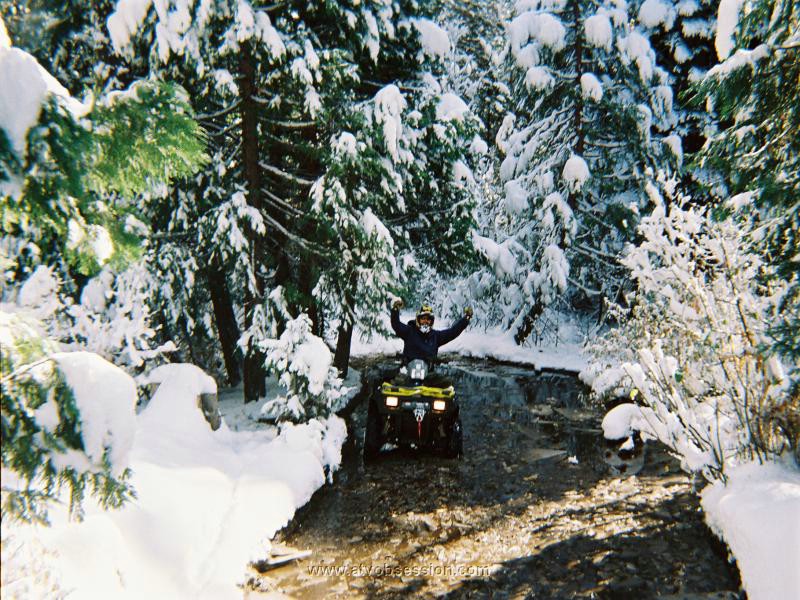 02. Ken crosses a frozen pond near Eagle Lakes Road.jpg