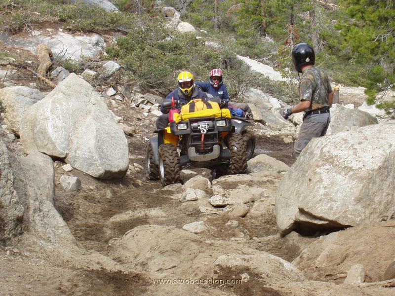 036. Jack watches Larry and Miren up a tricky section..jpg