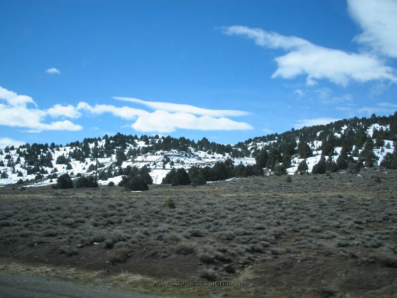 24. I could see dirt roads cut on to the side of the mountain..jpg