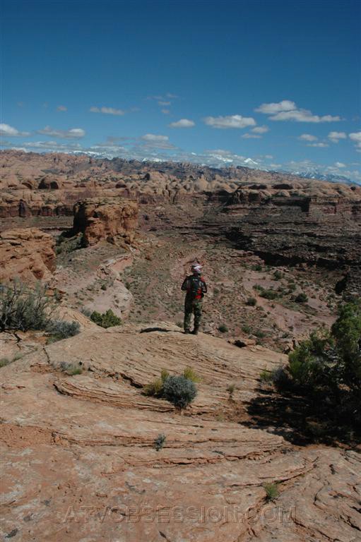 140. Ken walks to the edge and sees a couple bicyclists..jpg