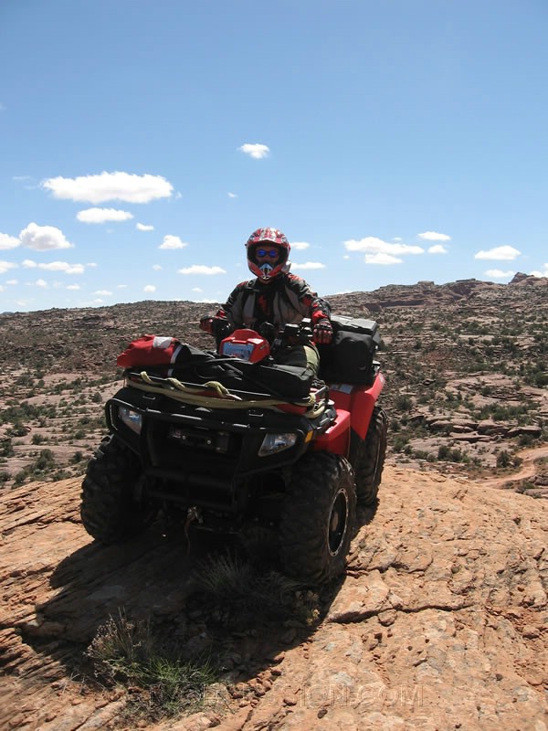 144. Ken hops back on his quad..jpg