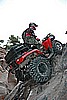 097. Even though I'm hanging 10 feet in the air, on a 900lb ATV by strand of plastic rope..jpg