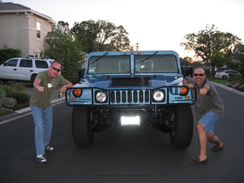 122. Terry and I goofing with the Hummer.jpg