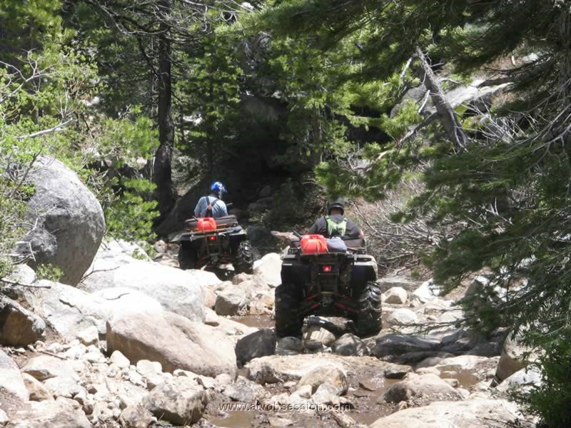 70. Dan just ahead of Logan working through the boulders..jpg